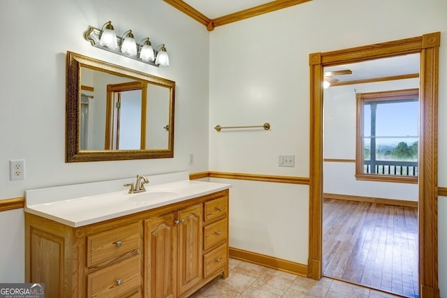 bathroom featuring vanity and crown molding