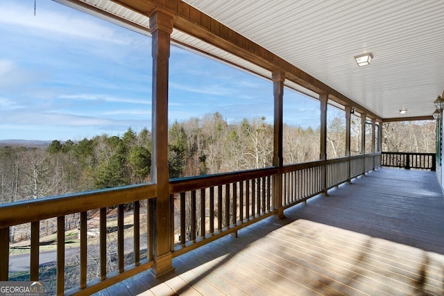 wooden terrace featuring a porch