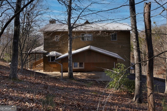 back of property with a patio area