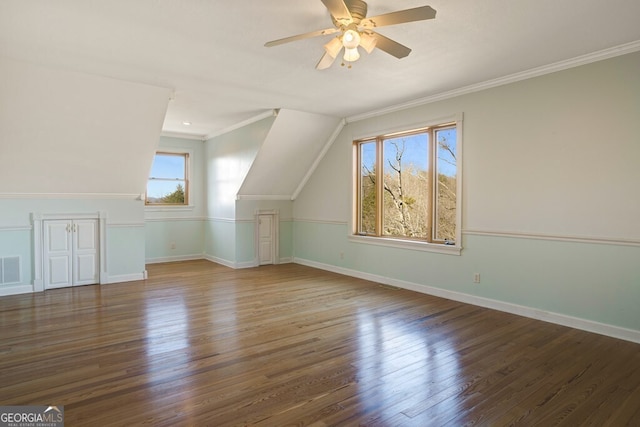 additional living space with dark hardwood / wood-style floors, ceiling fan, and lofted ceiling