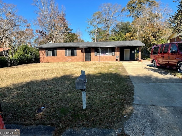 single story home with a front lawn