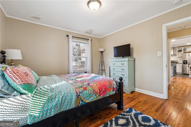 bedroom featuring ornamental molding, hardwood / wood-style floors, and stainless steel fridge with ice dispenser