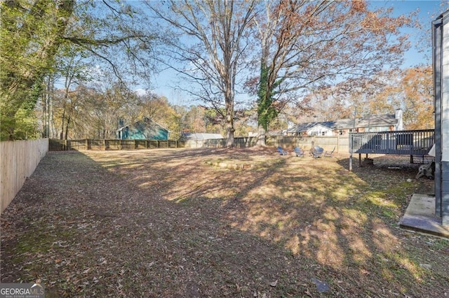 view of yard featuring a deck