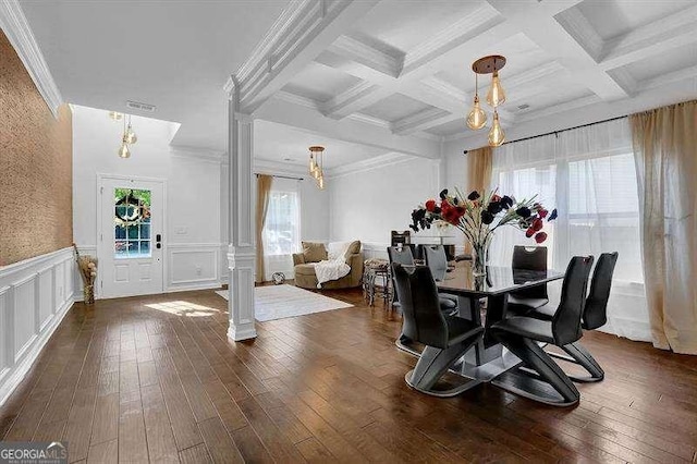 dining area with ornate columns, dark wood-type flooring, coffered ceiling, beamed ceiling, and crown molding