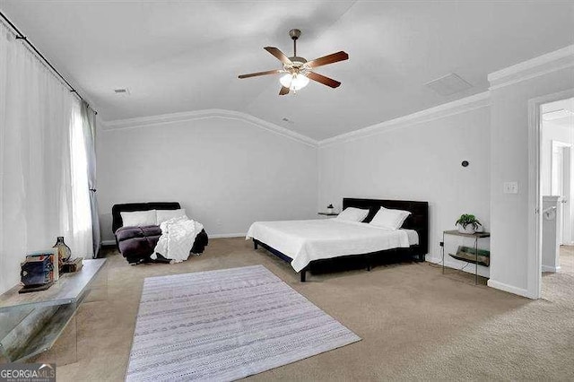 bedroom with ceiling fan, light colored carpet, crown molding, and vaulted ceiling