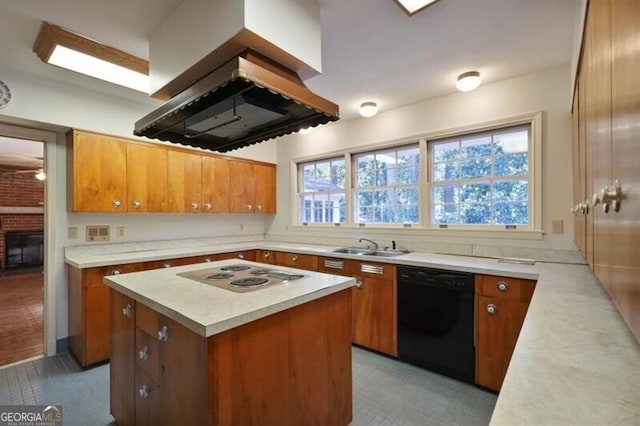 kitchen with a center island, white stovetop, a brick fireplace, black dishwasher, and range hood