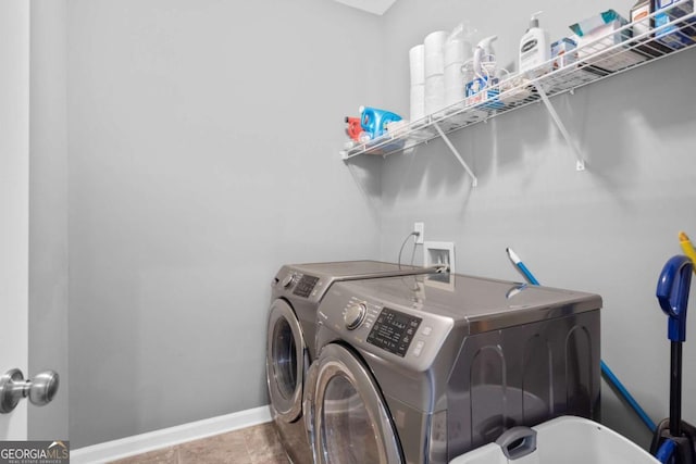 washroom featuring separate washer and dryer