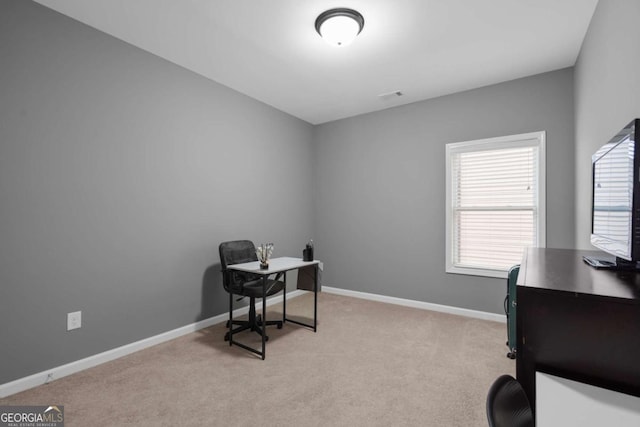 view of carpeted office space