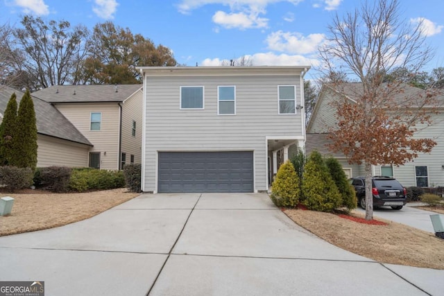 front of property with a garage