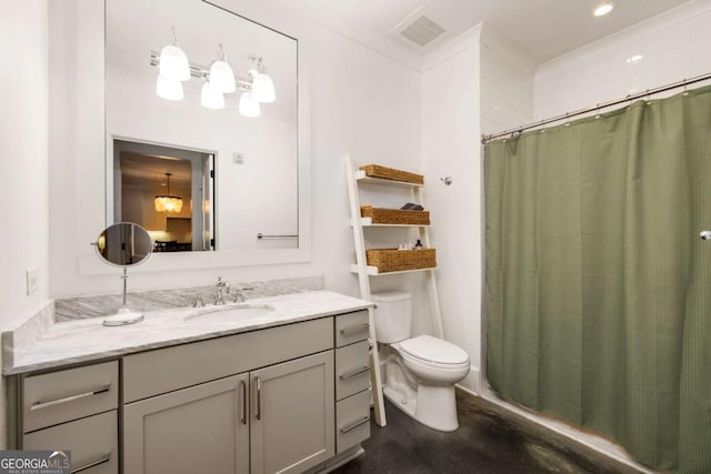 bathroom featuring vanity, toilet, and walk in shower