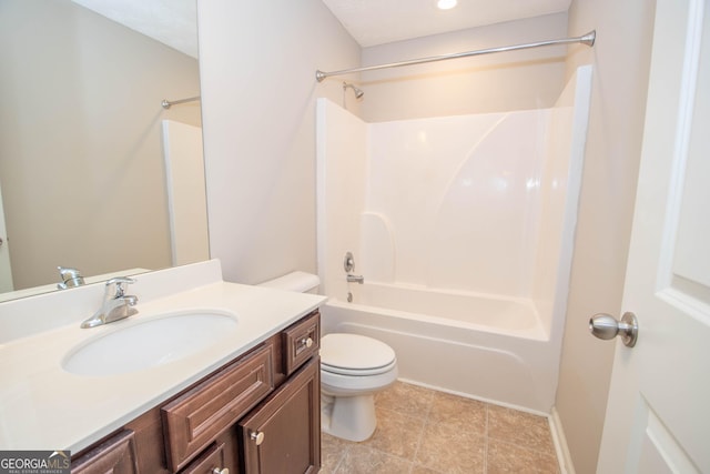 full bath featuring baseboards, toilet, vanity, and bathing tub / shower combination