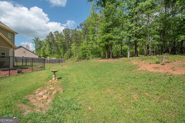 view of yard featuring fence