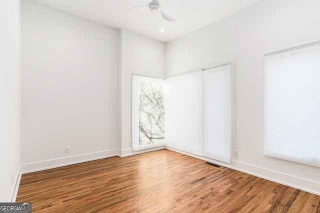 unfurnished bedroom featuring wood-type flooring and ceiling fan