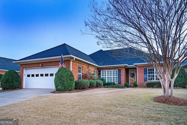 single story home featuring a front yard and a garage