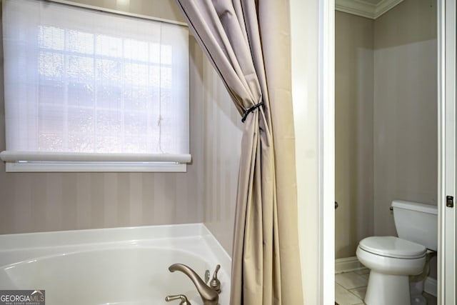 bathroom featuring tile patterned flooring, toilet, ornamental molding, and a bath