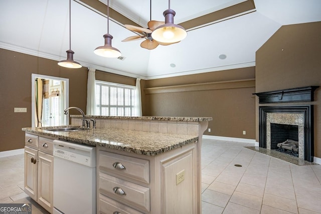 kitchen featuring lofted ceiling, white dishwasher, crown molding, sink, and ceiling fan