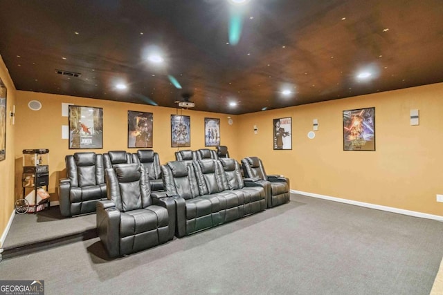 home theater room with carpet flooring