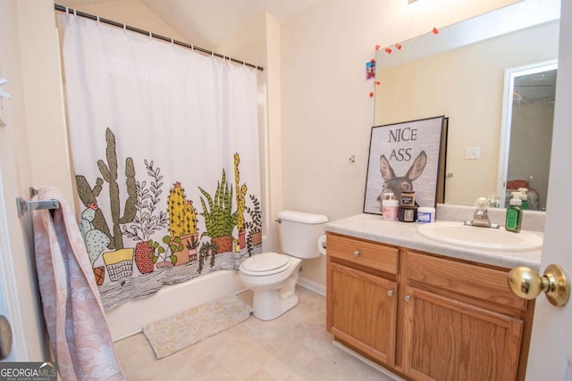 bathroom with vanity, toilet, walk in shower, and vaulted ceiling