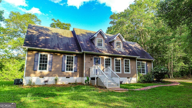 cape cod home with a front yard and cooling unit