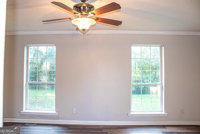 empty room with plenty of natural light and ornamental molding