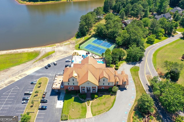 birds eye view of property featuring a water view