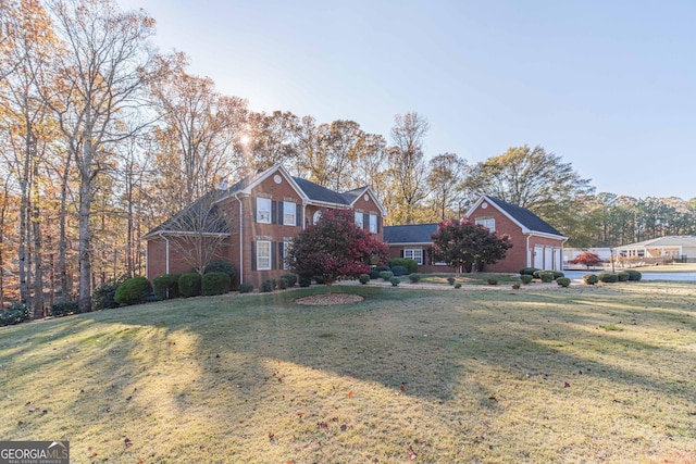 view of property featuring a front yard