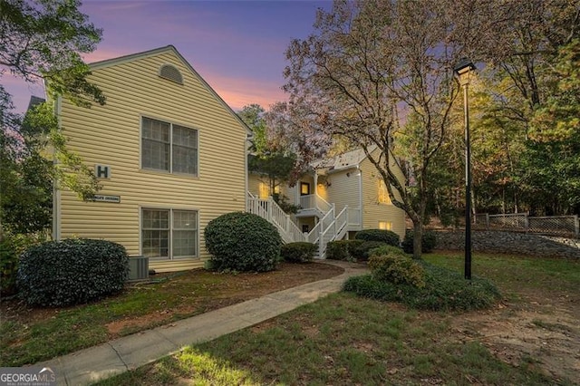 view of property exterior at dusk