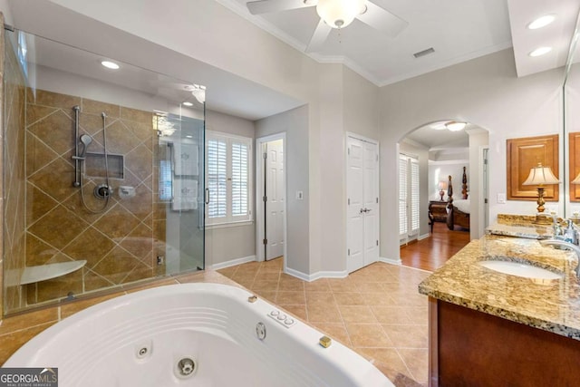 bathroom featuring ceiling fan, independent shower and bath, tile patterned floors, ornamental molding, and vanity