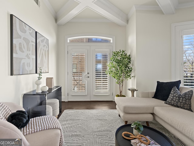 interior space featuring beamed ceiling, coffered ceiling, hardwood / wood-style floors, and french doors