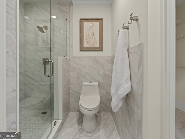 bathroom with tile walls, toilet, and walk in shower