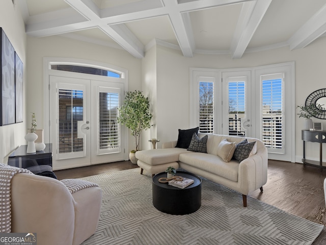 living room featuring beamed ceiling, wood-type flooring, and french doors