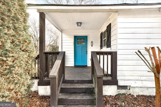 doorway to property with covered porch