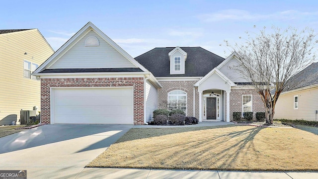 view of property with a garage, a front yard, and central AC