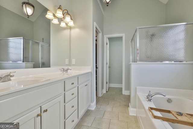 bathroom with tile patterned floors, vanity, lofted ceiling, and independent shower and bath