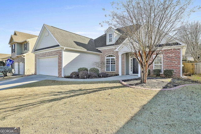 view of front facade featuring a garage and a front lawn