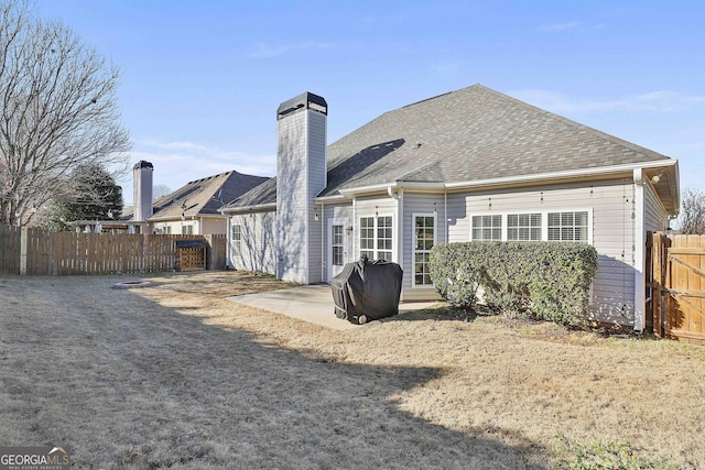 rear view of house featuring a patio