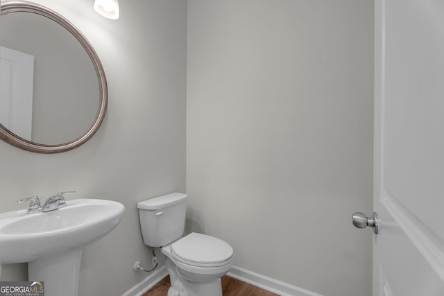 bathroom with sink and toilet