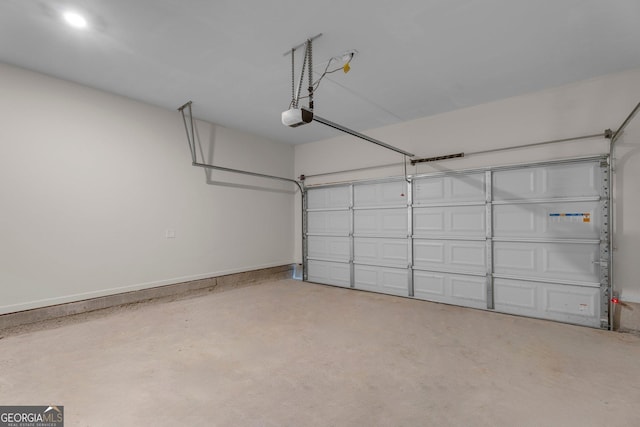 garage featuring a garage door opener