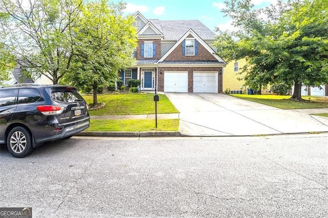 craftsman-style home with a front lawn and a garage