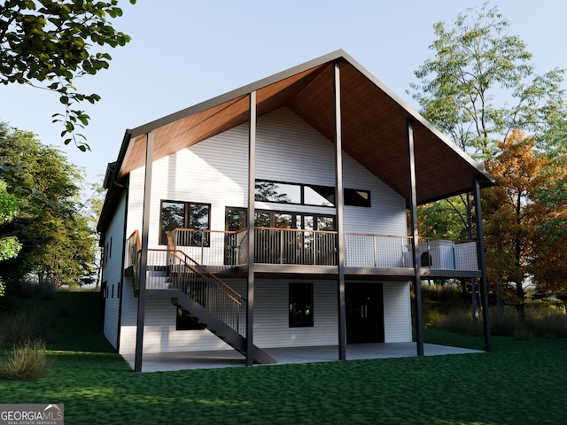 rear view of property with a patio area and a lawn