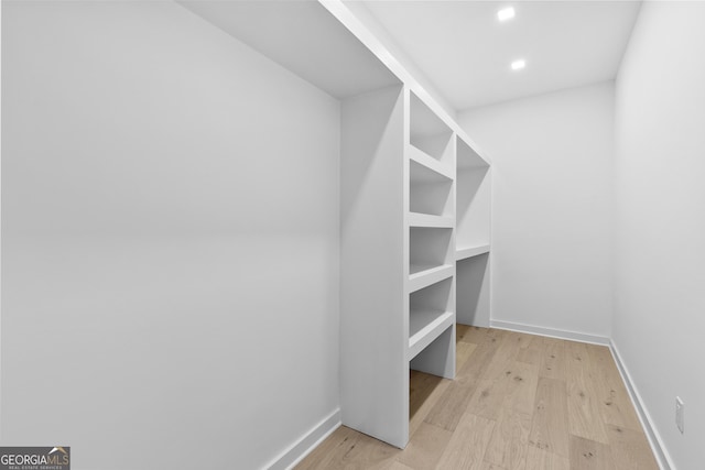 spacious closet with light wood-type flooring