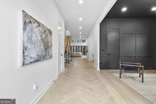 hall featuring light parquet flooring