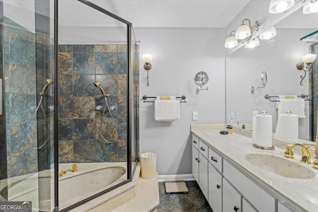 bathroom with vanity, a textured ceiling, and combined bath / shower with glass door