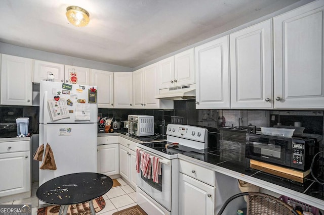 kitchen featuring white cabinetry, white appliances, and decorative backsplash