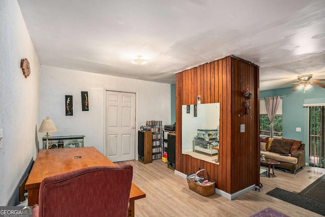 home office featuring ceiling fan and light wood-type flooring