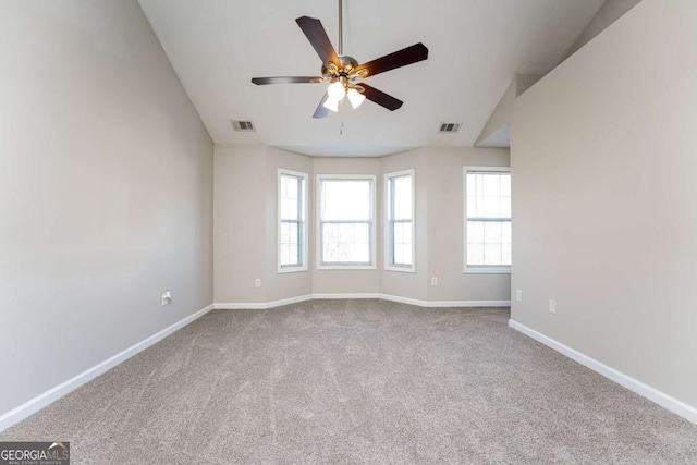 carpeted empty room with ceiling fan