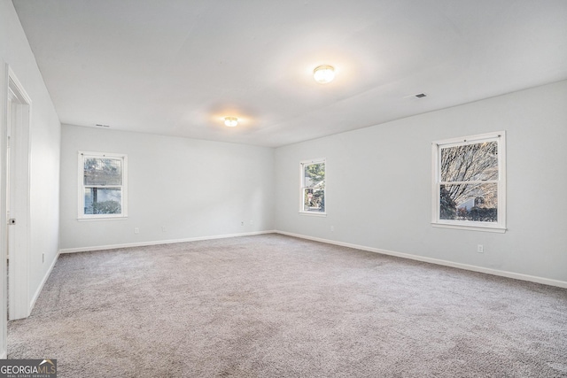 view of carpeted spare room