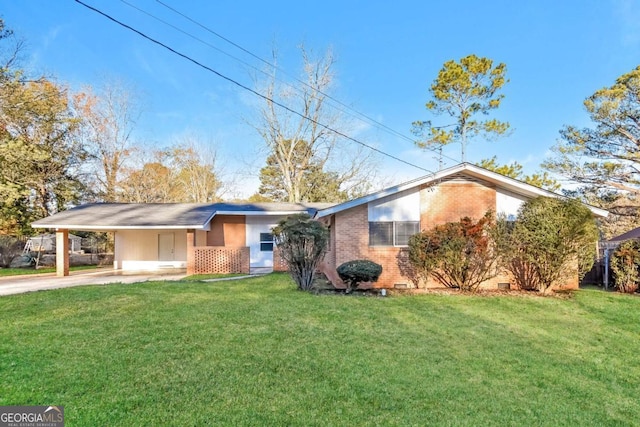 ranch-style home with a carport and a front lawn