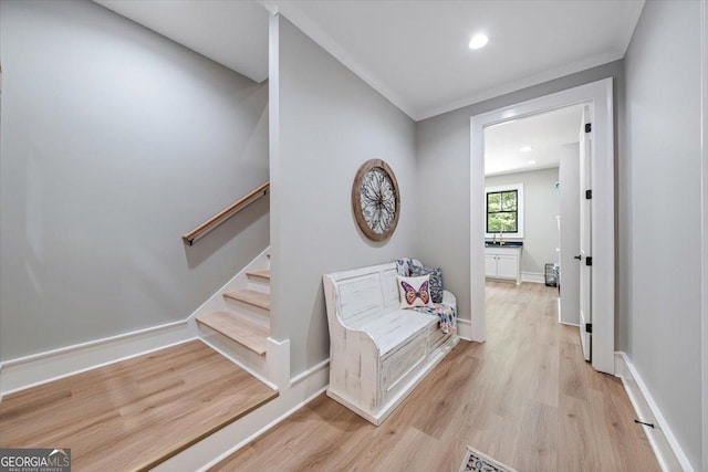 corridor featuring light hardwood / wood-style floors