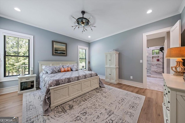 bedroom featuring light hardwood / wood-style flooring and ornamental molding